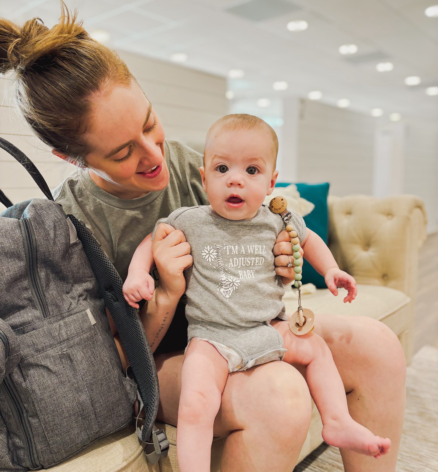 Mother with baby in Blossom Chiropractic office